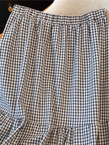 Korejski stil retro crno-bijele karirane suknje za žene, proljetni dizajn, osjećaj šuplje čipke, Gouhua šivanje, velika suknja A-kroja