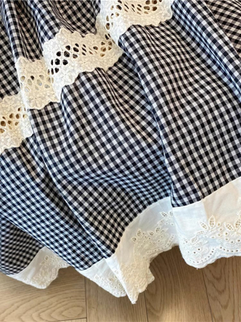 Korejski stil retro crno-bijele karirane suknje za žene, proljetni dizajn, osjećaj šuplje čipke, Gouhua šivanje, velika suknja A-kroja