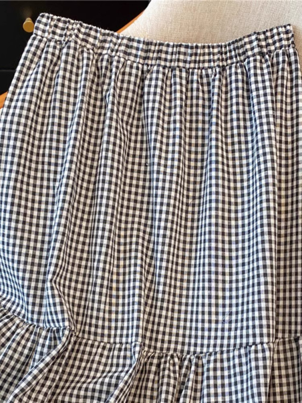 Korejski stil retro crno-bijele karirane suknje za žene, proljetni dizajn, osjećaj šuplje čipke, Gouhua šivanje, velika suknja A-kroja