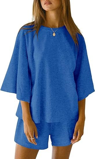 2025-ös nyári új, határokon átnyúló külkereskedelmi női kétrészes szett, hét ujjú felső és rövid nadrág, lezser kosztüm