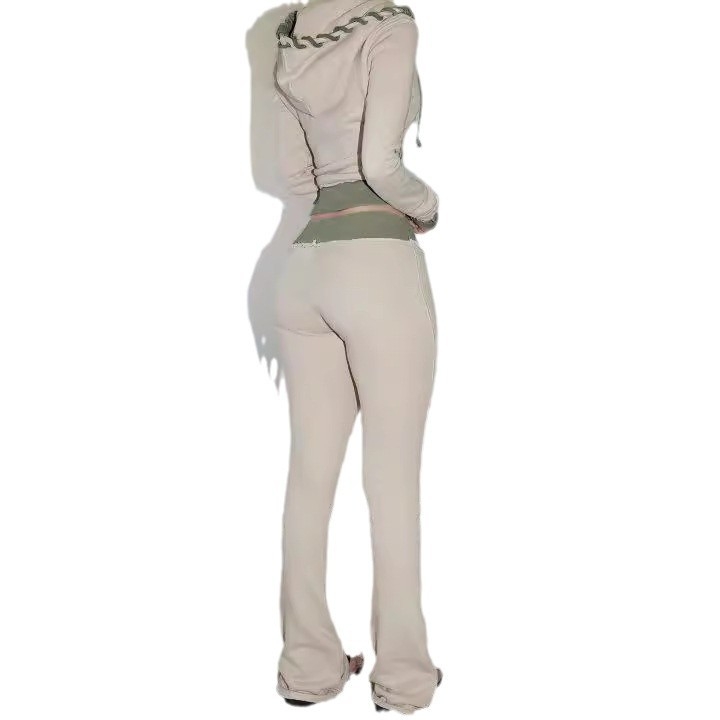 Európska a americká módna farebne blokovaná pásová patchworková rozšírená pletená mikina s priehľadným strihom, ležérne dlhé nohavice