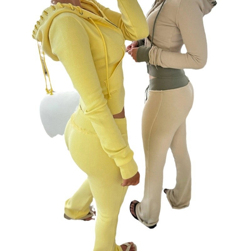 Európska a americká módna farebne blokovaná pásová patchworková rozšírená pletená mikina s priehľadným strihom, ležérne dlhé nohavice