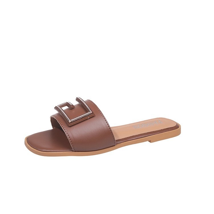 Prekogranične ravne papuče za žene, ljetna vanjska odjeća 2024., novi stil, internetski poznate modne papuče s metalnom kopčom i okruglom glavom, ravnog dna za žene