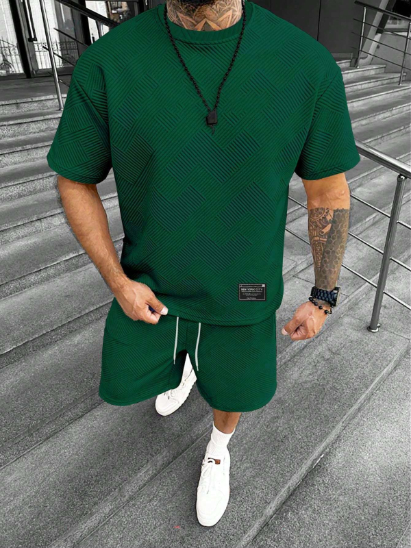 Suvine ühevärviline tekstuuriga ülikond Meeste lühikeste varrukatega T-särk Lühikesed püksid Meeste kaheosaline spordiriietus Vabaajariietus Meeste ME2-MA1
