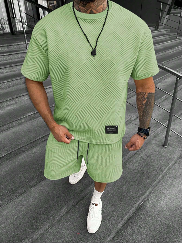 Suvine ühevärviline tekstuuriga ülikond Meeste lühikeste varrukatega T-särk Lühikesed püksid Meeste kaheosaline spordiriietus Vabaajariietus Meeste ME2-MA1
