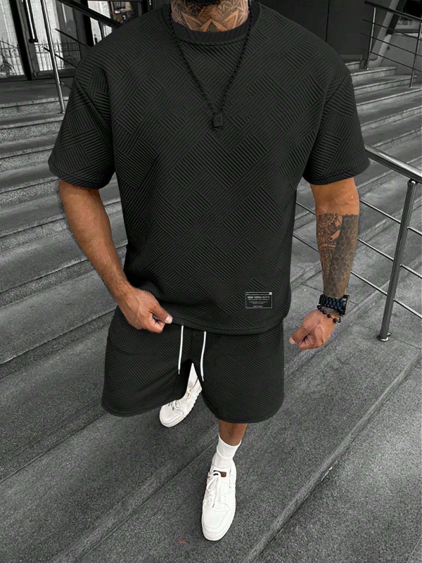 Suvine ühevärviline tekstuuriga ülikond Meeste lühikeste varrukatega T-särk Lühikesed püksid Meeste kaheosaline spordiriietus Vabaajariietus Meeste ME2-MA1