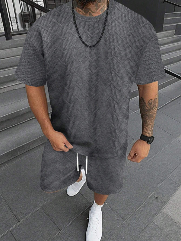 Suvine ühevärviline tekstuuriga ülikond Meeste lühikeste varrukatega T-särk Lühikesed püksid Meeste kaheosaline spordiriietus Vabaajariietus Meeste ME2-MA1