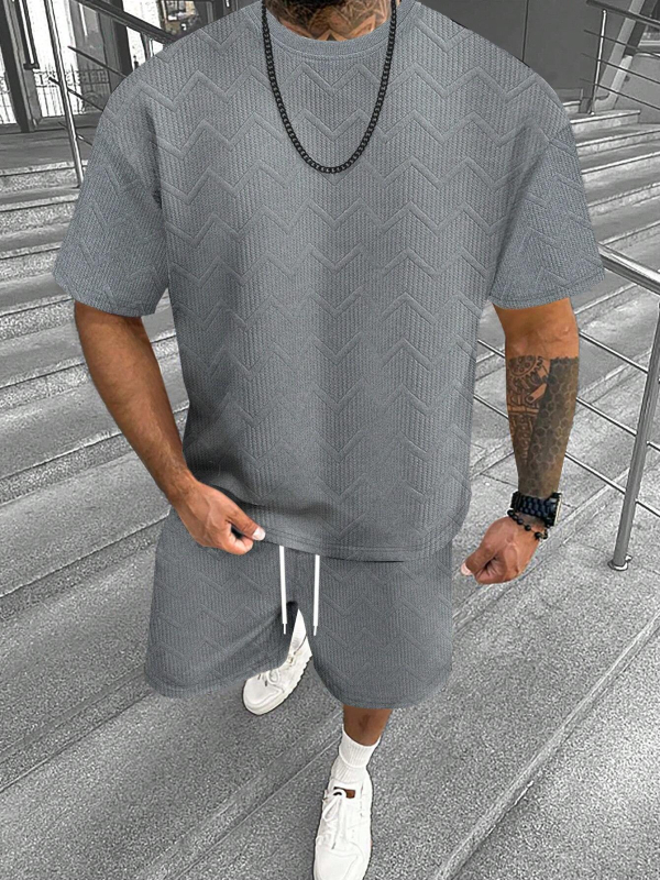 Suvine ühevärviline tekstuuriga ülikond Meeste lühikeste varrukatega T-särk Lühikesed püksid Meeste kaheosaline spordiriietus Vabaajariietus Meeste ME2-MA1