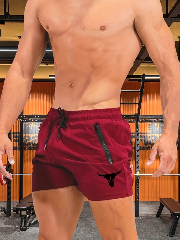 Väliskaubanduse spordikiiresti kuivavad lühikesed püksid Piiriülesed suvised laos Keskmise vöökohaga meeste voodrita kolmepunktilised lühikesed püksid, millel on hele plaat.