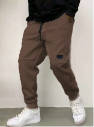 2023. aasta Amazon Independent Stationi keermestatud pingutusnööriga vabaaja paksendatud püksid. Trendikad brändi fliisvoodriga püksid. Mugavad, soojad ja vabaaja. Mitmekülgsed.