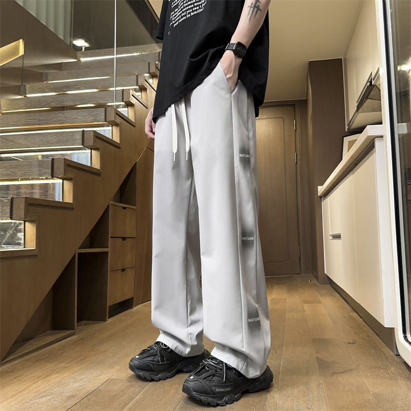 Pánske ležérne nohavice rovného strihu s bočným pruhom a písmenami, všestranné na jar a jeseň, štýlové a športové tepláky, vďaka ktorým budete vyzerať vyššie, dlhé nohavice so širokými nohavicami