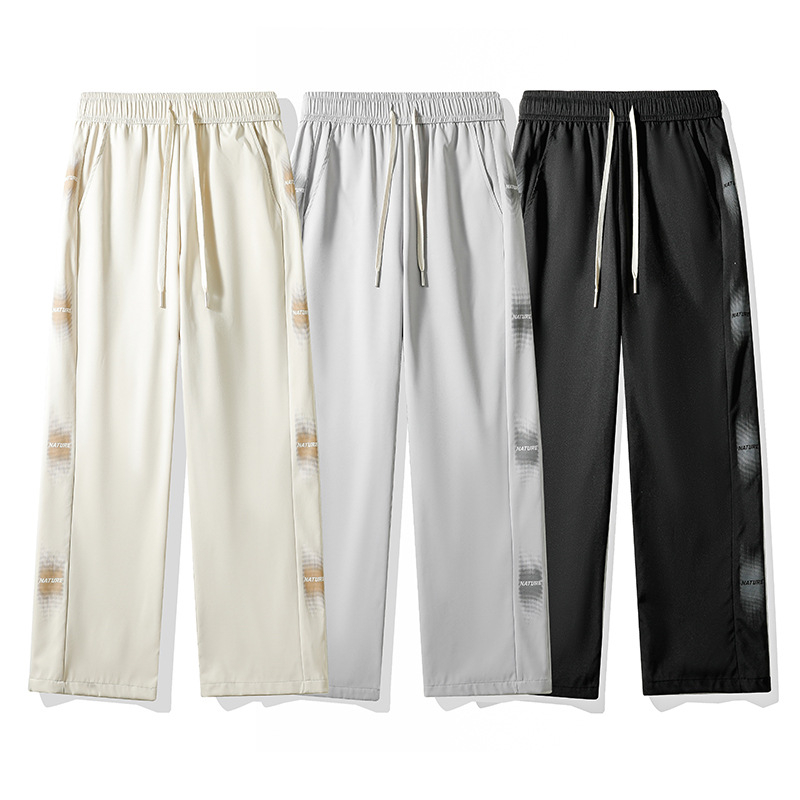 Pánske ležérne nohavice rovného strihu s bočným pruhom a písmenami, všestranné na jar a jeseň, štýlové a športové tepláky, vďaka ktorým budete vyzerať vyššie, dlhé nohavice so širokými nohavicami