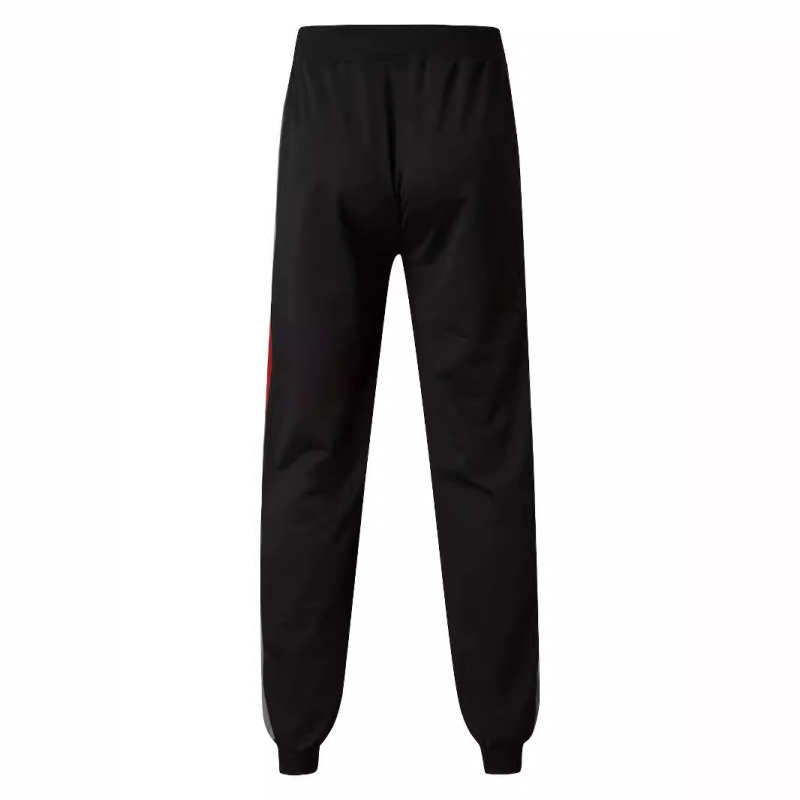 Europietiško dydžio plius dydžio „Aliexpress“ eksportuojamos geriausiai parduodamos sportinės kelnės. Mados kelnės su sujungimo dizainu. Sportinės kelnės.