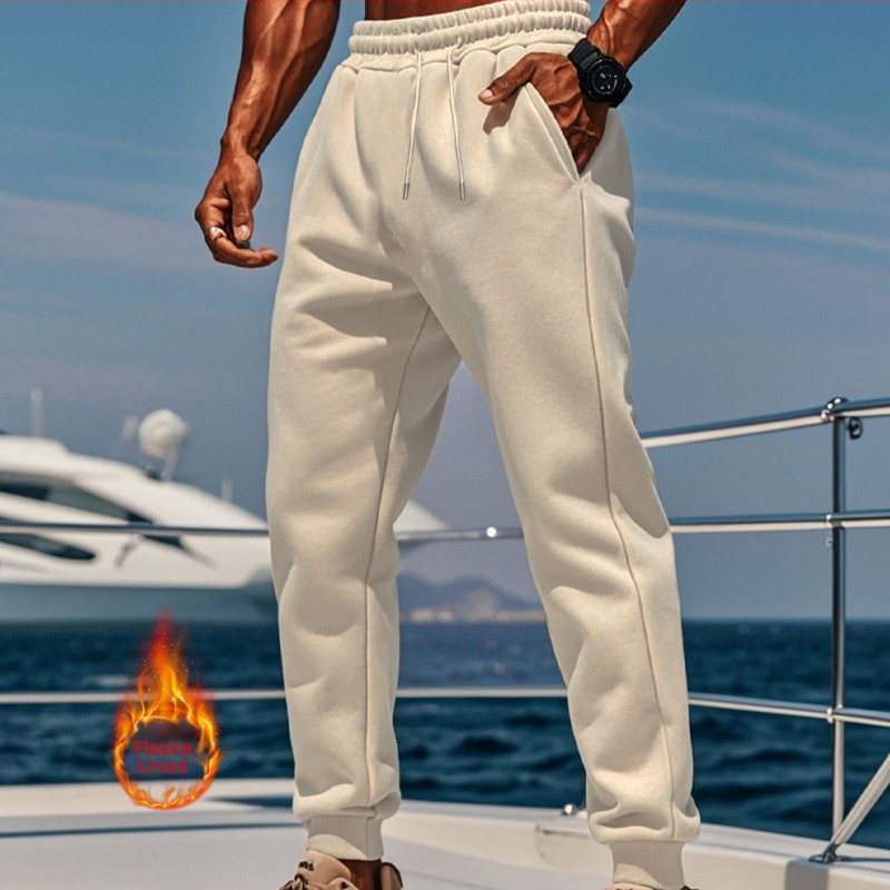 Cezhraničný elektronický obchod jeseň a zima európske a americké pánske ležérne flísové jednofarebné módne nohavice vhodné na outdoorové športové nosenie