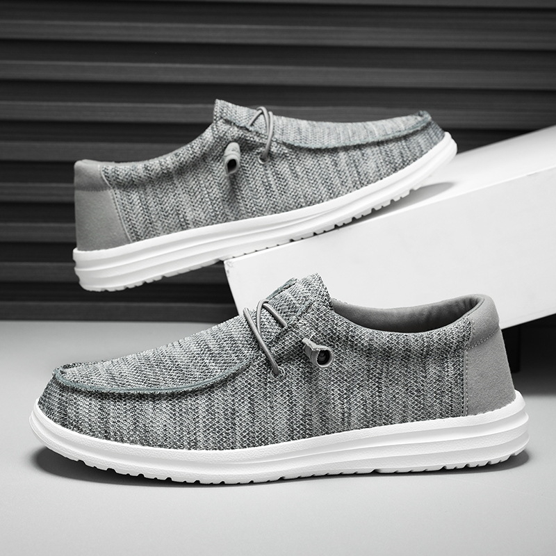 Väliskaubanduse pluss-suurus 50 meeste mokassiinid, lendava kootud võrgust vabaajajalatsid, piiriülesed libisevad ja kerged isakingad, sõidukingad