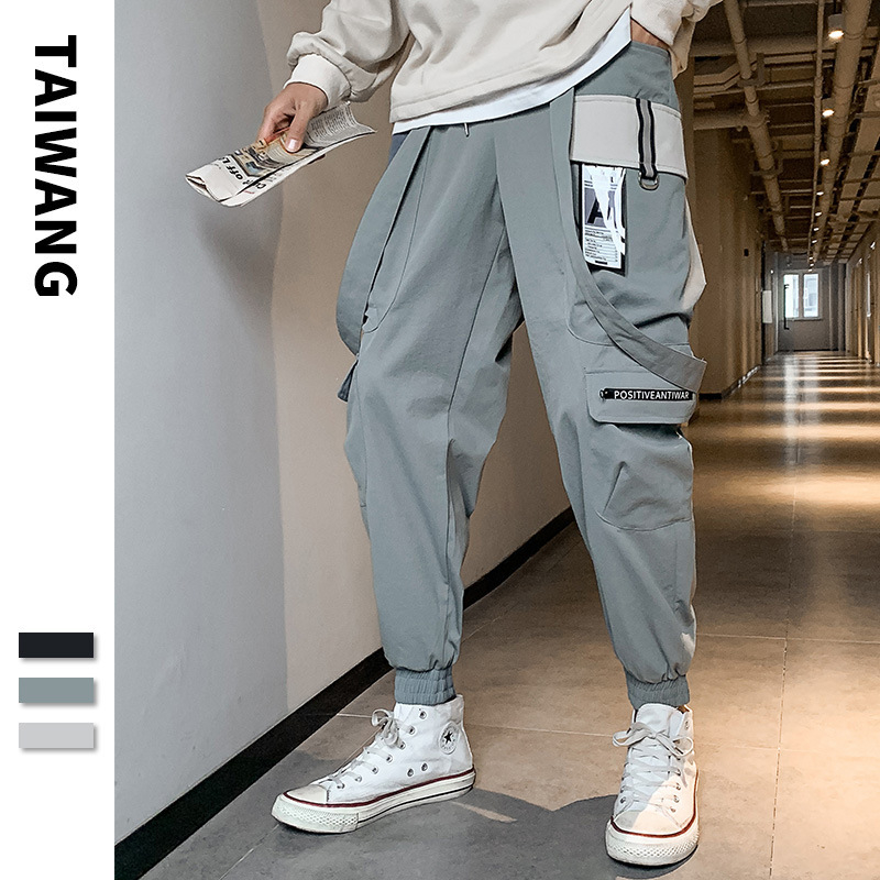 Pánske cargo nohavice z priameho predaja z továrne, jar 2023, nové ležérne nohavice pre mužov a tínedžerov, hongkonský štýl, trendy značkové nohavice s viacerými vreckami a zaväzovaním na nohavice