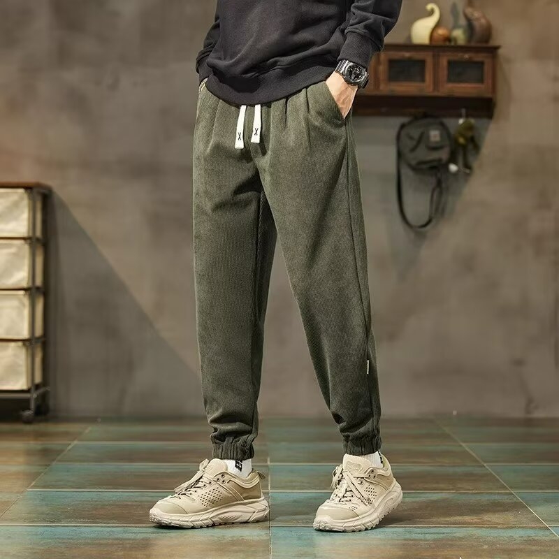 Meeste kordvelvetist vabaajapüksid, uued kevad- ja sügispüksid, mitmekülgsed ja trendikad haaremispordipüksid meestele, moebrändi lahtised pahkluu-sidemega püksid