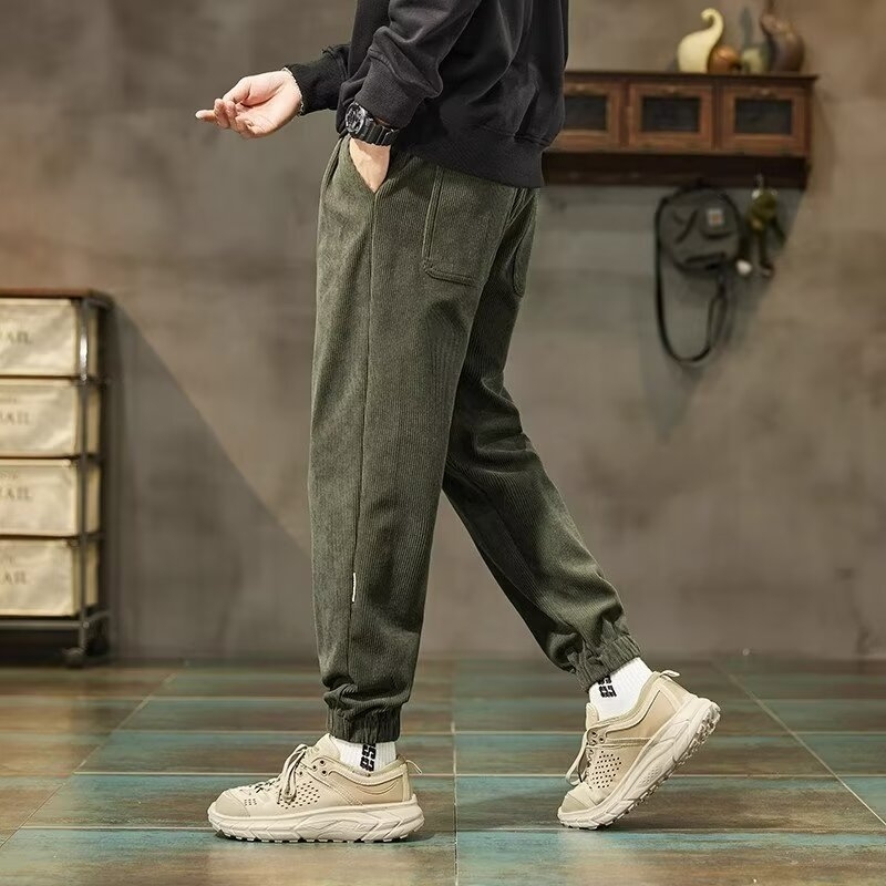 Meeste kordvelvetist vabaajapüksid, uued kevad- ja sügispüksid, mitmekülgsed ja trendikad haaremispordipüksid meestele, moebrändi lahtised pahkluu-sidemega püksid