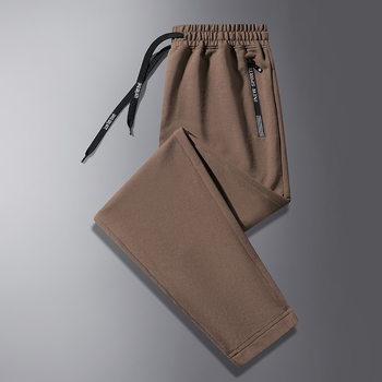 Jarné a jesenné ležérne nohavice pánske voľné nohavice so zaviazanými členkami, pánske tepláky vo veľkých veľkostiach, trendy športové nohavice pre mladých a stredných vekových kategórií.