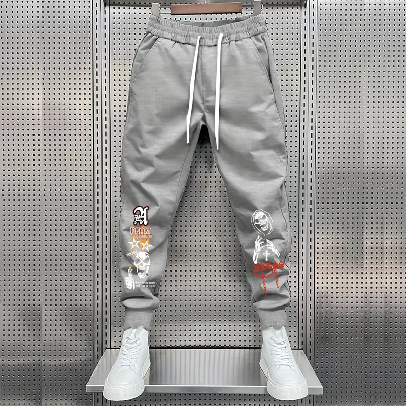 Rudens naujos amerikietiško stiliaus plius dydžio „High Street“ hiphopo rašto gėlių kaspino vyriškos sportinės kelnės