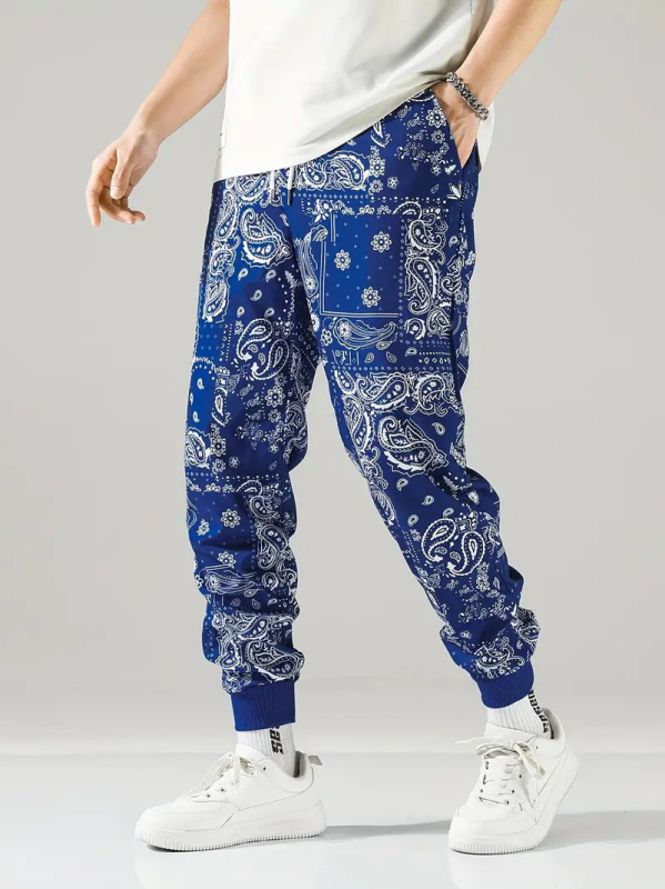 2025. aasta kevad- ja sügisesed uued Euroopa ja Ameerika Hongkongi stiilis lahtised meeste püksid, sügisesed populaarsed kamuflaažitrükiga spordipüksid ML01