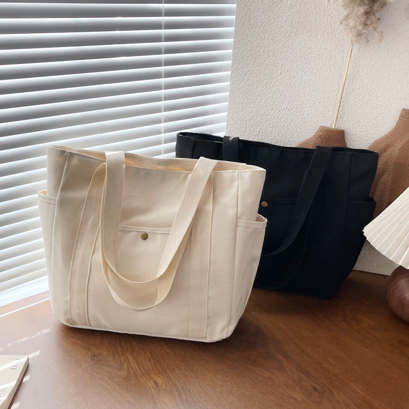 2024. aasta uus lõuendikott, naiste universaalne õlakott, suure mahutavusega raamatutega täidetud õpilase klassiruumi pendeldajakott, uus käekott