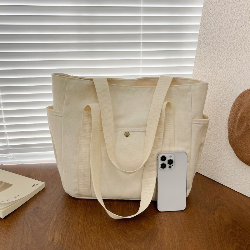 2024. aasta uus lõuendikott, naiste universaalne õlakott, suure mahutavusega raamatutega täidetud õpilase klassiruumi pendeldajakott, uus käekott