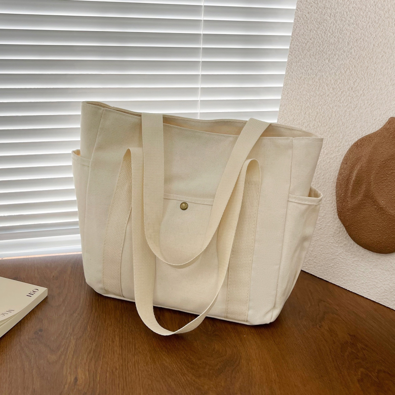 2024. aasta uus lõuendikott, naiste universaalne õlakott, suure mahutavusega raamatutega täidetud õpilase klassiruumi pendeldajakott, uus käekott