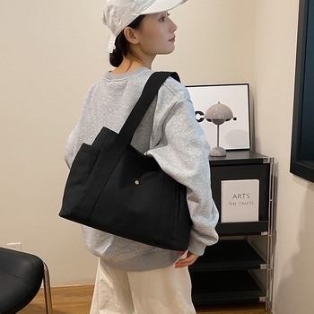 2024. aasta uus lõuendikott, naiste universaalne õlakott, suure mahutavusega raamatutega täidetud õpilase klassiruumi pendeldajakott, uus käekott