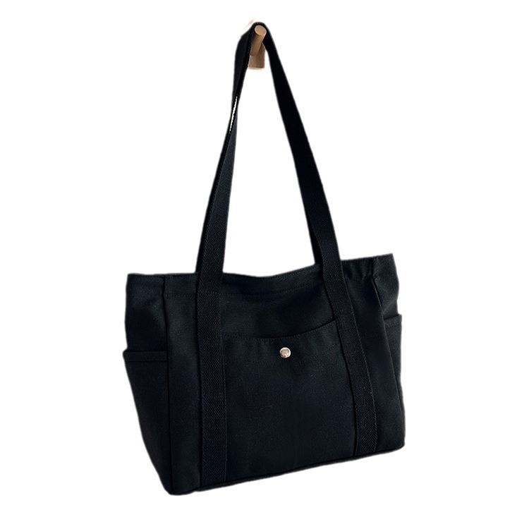 2024. aasta uus lõuendikott, naiste universaalne õlakott, suure mahutavusega raamatutega täidetud õpilase klassiruumi pendeldajakott, uus käekott