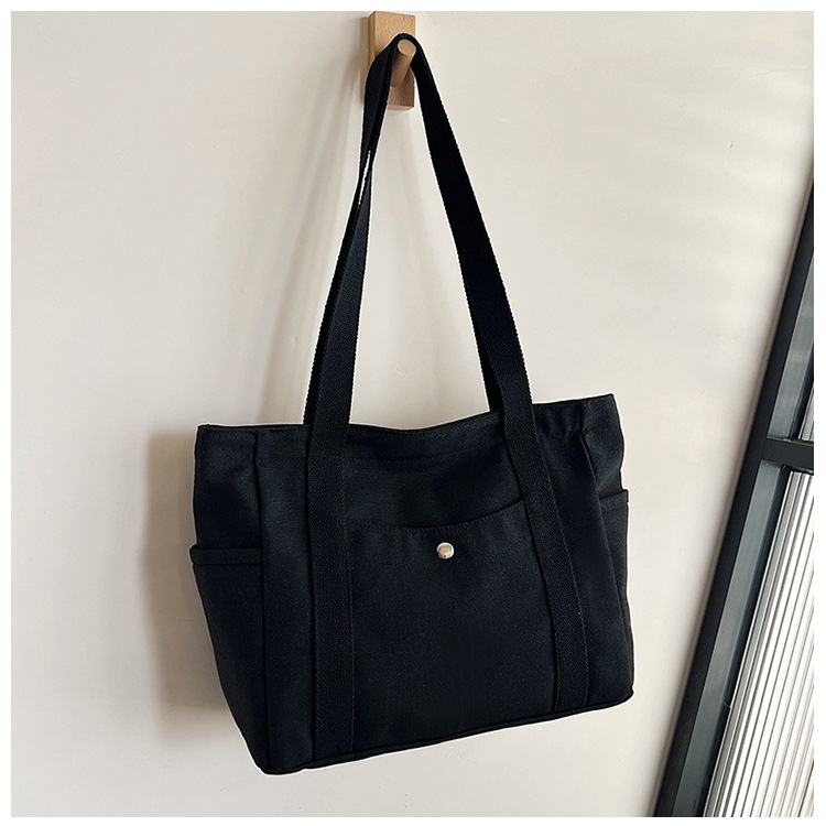 2024. aasta uus lõuendikott, naiste universaalne õlakott, suure mahutavusega raamatutega täidetud õpilase klassiruumi pendeldajakott, uus käekott