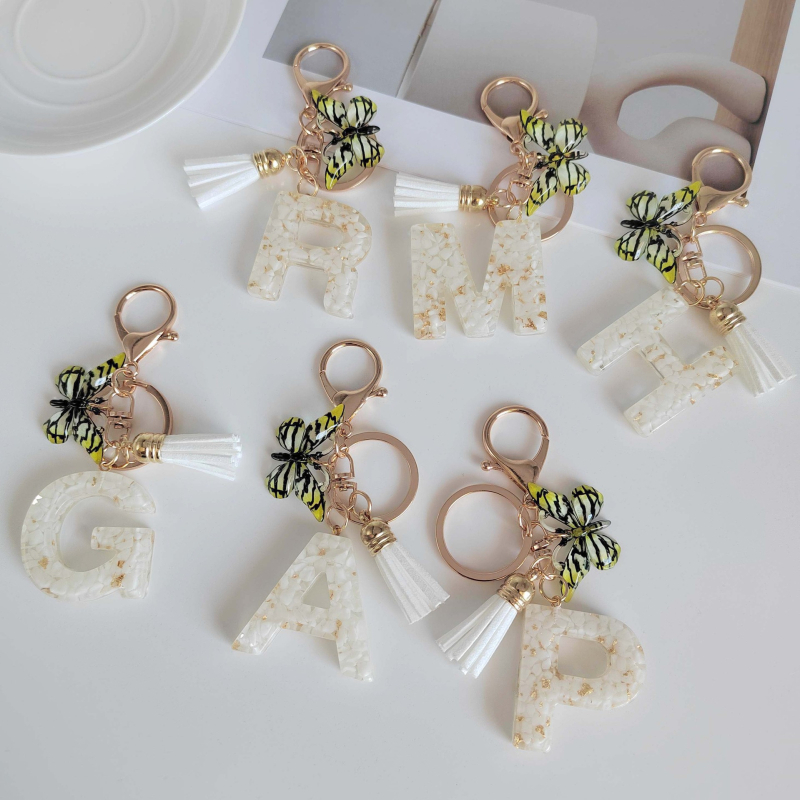 Tarpvalstybinis 26 inicialų raktų pakabukas su kutais, drugelio pakabuku, raktų pakabukas, blizgučiai, dervos raktų gamintojai, tiesūs plaukai