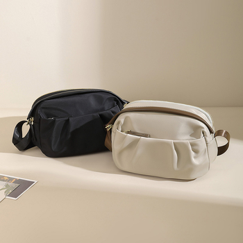 Guangzhou kotid 2025 uus lõuendist moodne õlakott naiste õlakott väike suvine vabaaja kott lihtsaim mängu mobiiltelefonikott