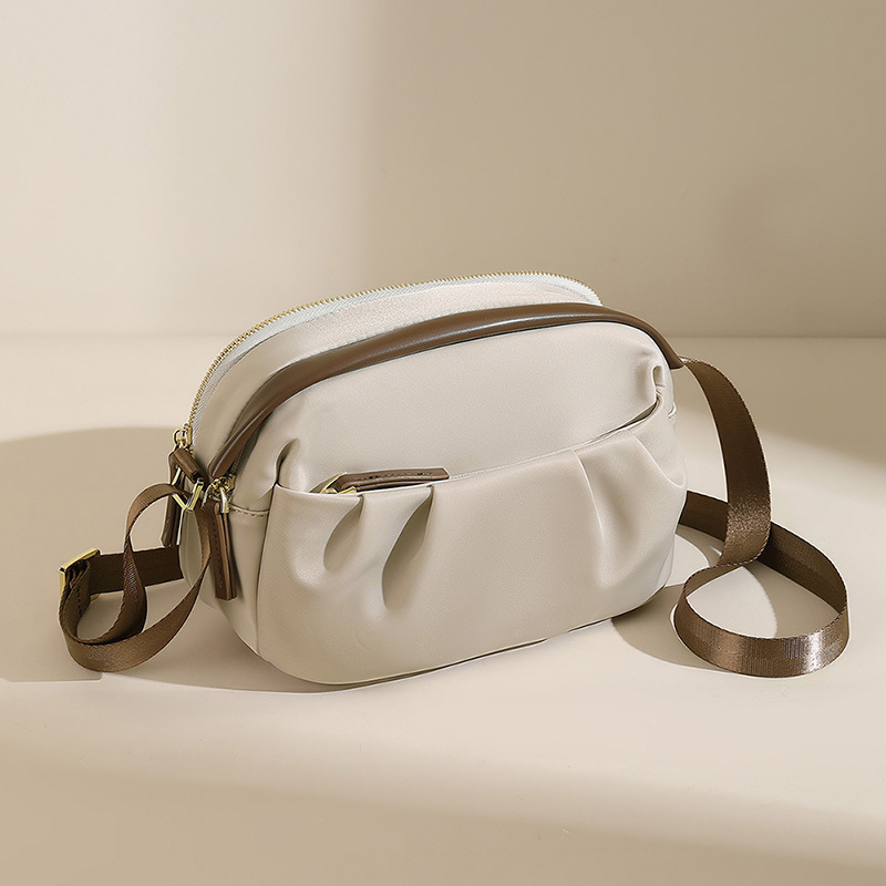 Guangzhou kotid 2025 uus lõuendist moodne õlakott naiste õlakott väike suvine vabaaja kott lihtsaim mängu mobiiltelefonikott