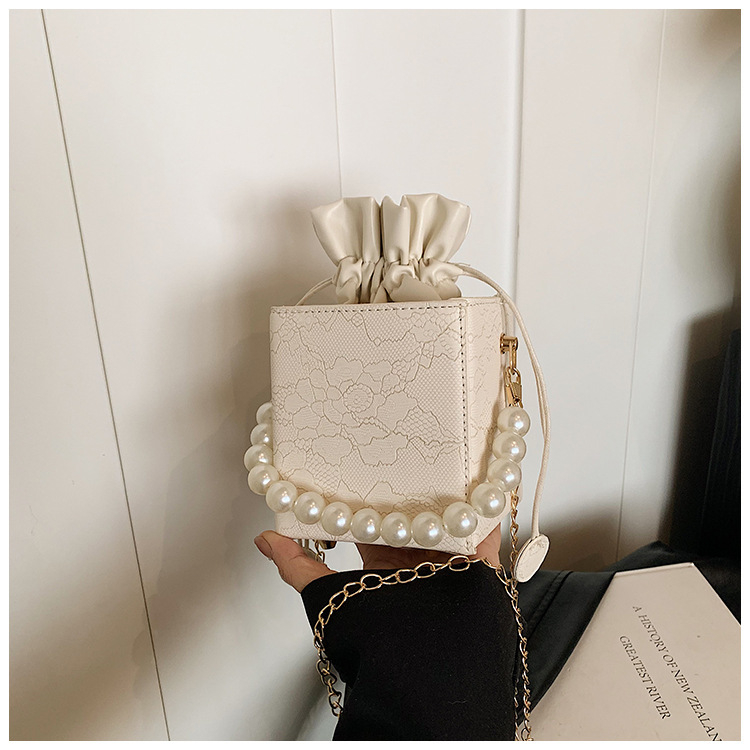 Aukštos klasės mažas krepšys moterims 2024 m. naujo stiliaus raišteliu užsegamas kibiro krepšys moterims laisvalaikio grandinėlės formos krepšys su karoliukais per petį