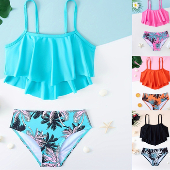 25-aastane Euroopa ja Ameerika laste ujumistrikoo, troopilise mustriga, lõhestatud, keskmise ja suure suurusega tüdrukute ujumistrikoo, mereäärne puhkusepäikesekaitse