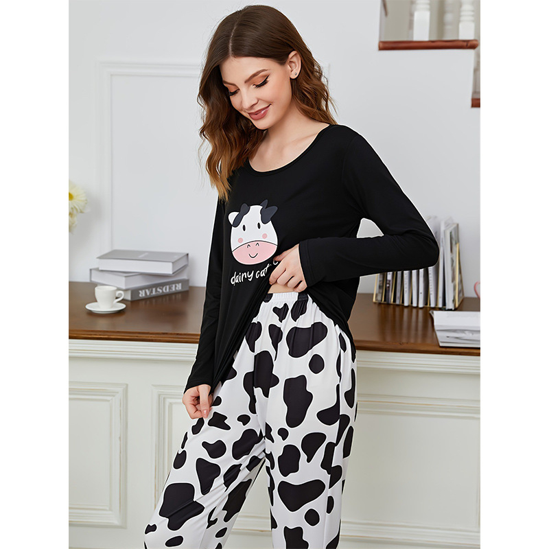 Europska i američka izvozna pidžama, dvodijelni set dugih rukava i dugih hlača, mliječna svila s printom crtanih dinosaura po cijelom području, novi prekogranični proizvod