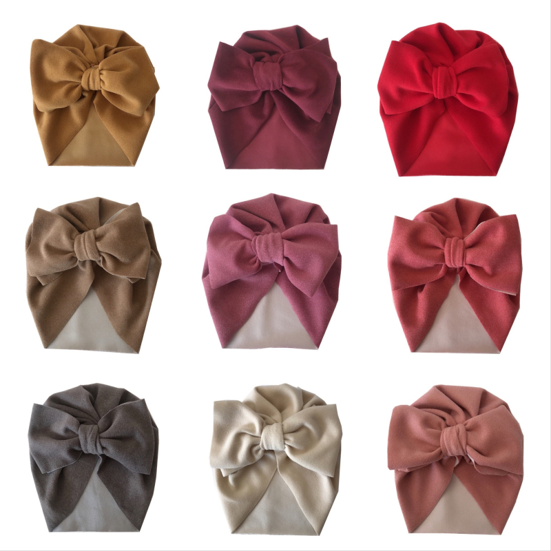 Európai és amerikai őszi és téli gyermek nagy masnis indiai kalap kasmír gyermek pulóver sapka magzati sapka