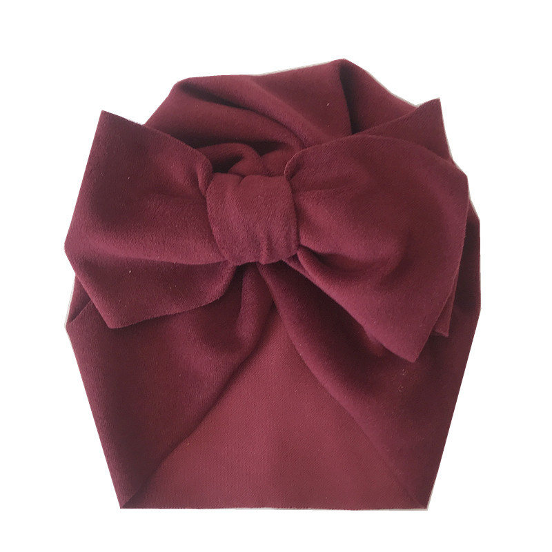 Európai és amerikai őszi és téli gyermek nagy masnis indiai kalap kasmír gyermek pulóver sapka magzati sapka