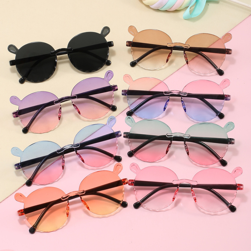Karukujulised ühes tükis raamiga laste päikeseprillid, armsad koomiksiprillid, päikesesirm, UV-kaitsega gradientvärvi päikeseprillid, kassisilmaprillid
