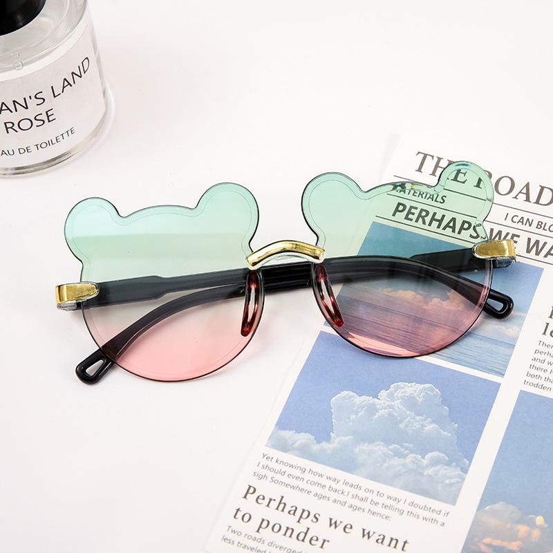 Karukujulised ühes tükis raamiga laste päikeseprillid, armsad koomiksiprillid, päikesesirm, UV-kaitsega gradientvärvi päikeseprillid, kassisilmaprillid