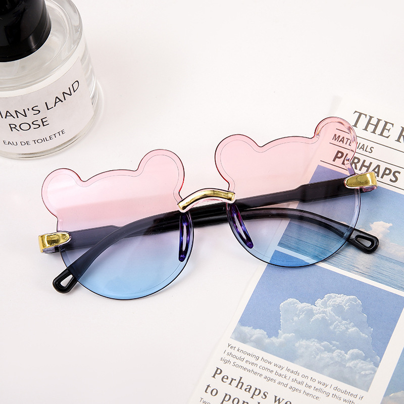 Karukujulised ühes tükis raamiga laste päikeseprillid, armsad koomiksiprillid, päikesesirm, UV-kaitsega gradientvärvi päikeseprillid, kassisilmaprillid