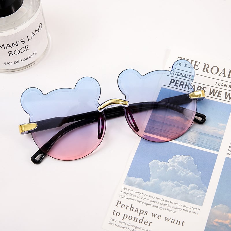 Karukujulised ühes tükis raamiga laste päikeseprillid, armsad koomiksiprillid, päikesesirm, UV-kaitsega gradientvärvi päikeseprillid, kassisilmaprillid