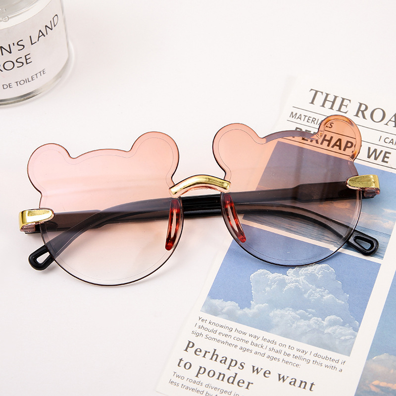 Karukujulised ühes tükis raamiga laste päikeseprillid, armsad koomiksiprillid, päikesesirm, UV-kaitsega gradientvärvi päikeseprillid, kassisilmaprillid