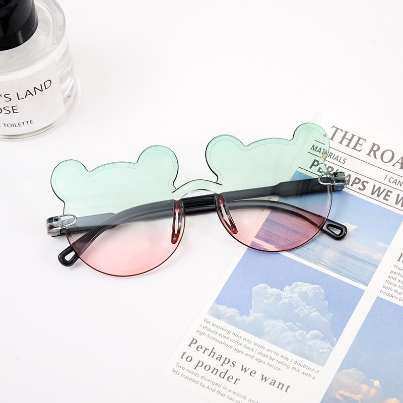 Karukujulised ühes tükis raamiga laste päikeseprillid, armsad koomiksiprillid, päikesesirm, UV-kaitsega gradientvärvi päikeseprillid, kassisilmaprillid