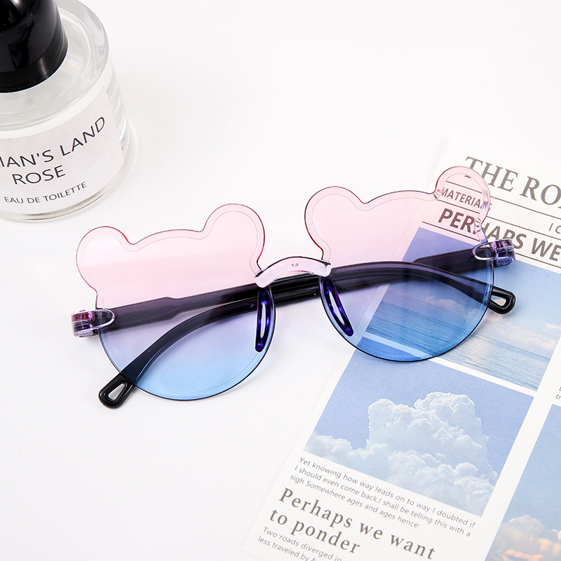 Karukujulised ühes tükis raamiga laste päikeseprillid, armsad koomiksiprillid, päikesesirm, UV-kaitsega gradientvärvi päikeseprillid, kassisilmaprillid