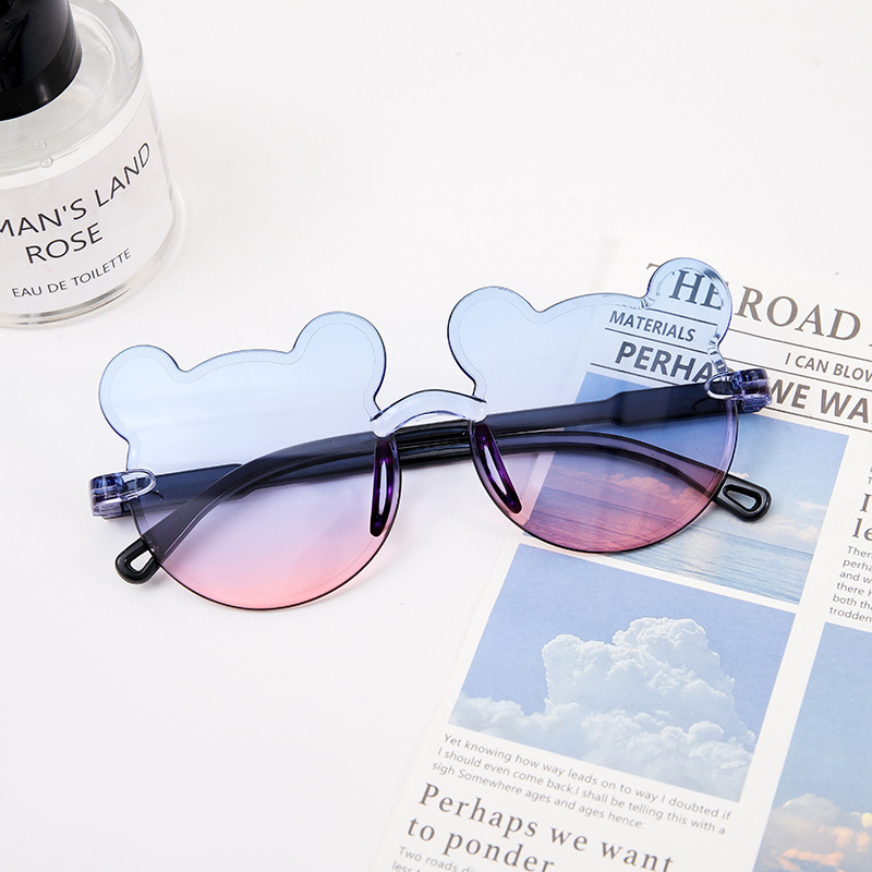 Karukujulised ühes tükis raamiga laste päikeseprillid, armsad koomiksiprillid, päikesesirm, UV-kaitsega gradientvärvi päikeseprillid, kassisilmaprillid