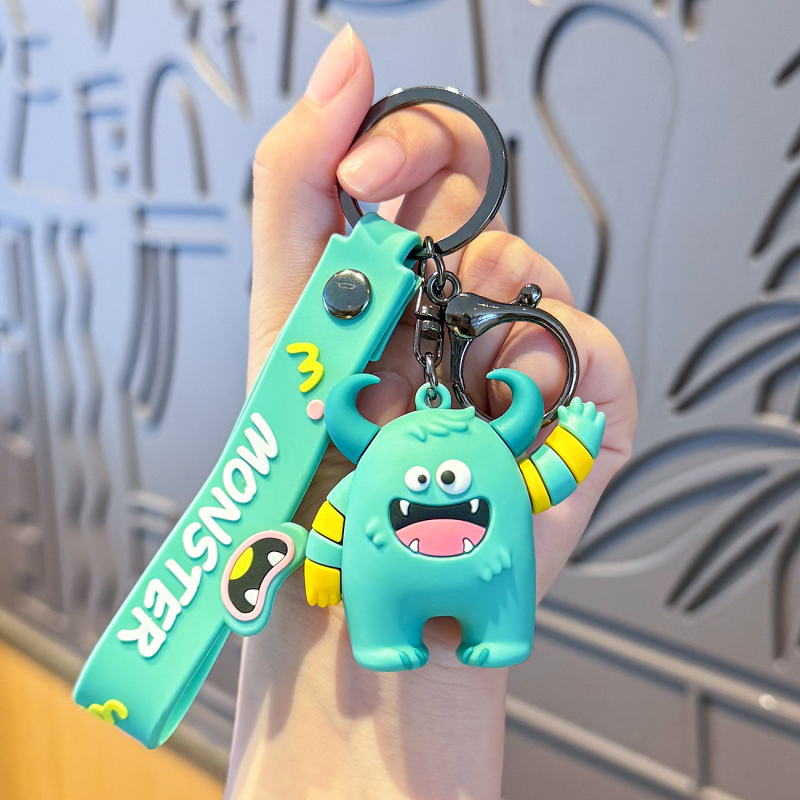 Radošs briesmoņa multfilmas atslēgu piekariņš sievietēm, jauks trīsdimensiju lelles kulons, moderns skolas somas piekarināms atslēgas mazs kulons