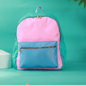 Piiriülene uus nailonist koolikott kommivärvi lihtne ühevärviline seljakott suure mahutavusega õpilase seljakott õue reisikott