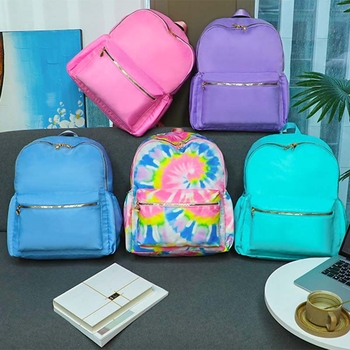 Piiriülene uus nailonist koolikott kommivärvi lihtne ühevärviline seljakott suure mahutavusega õpilase seljakott õue reisikott